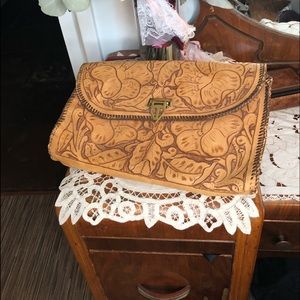 Vintage 1970’s Tooled leather clutch purse